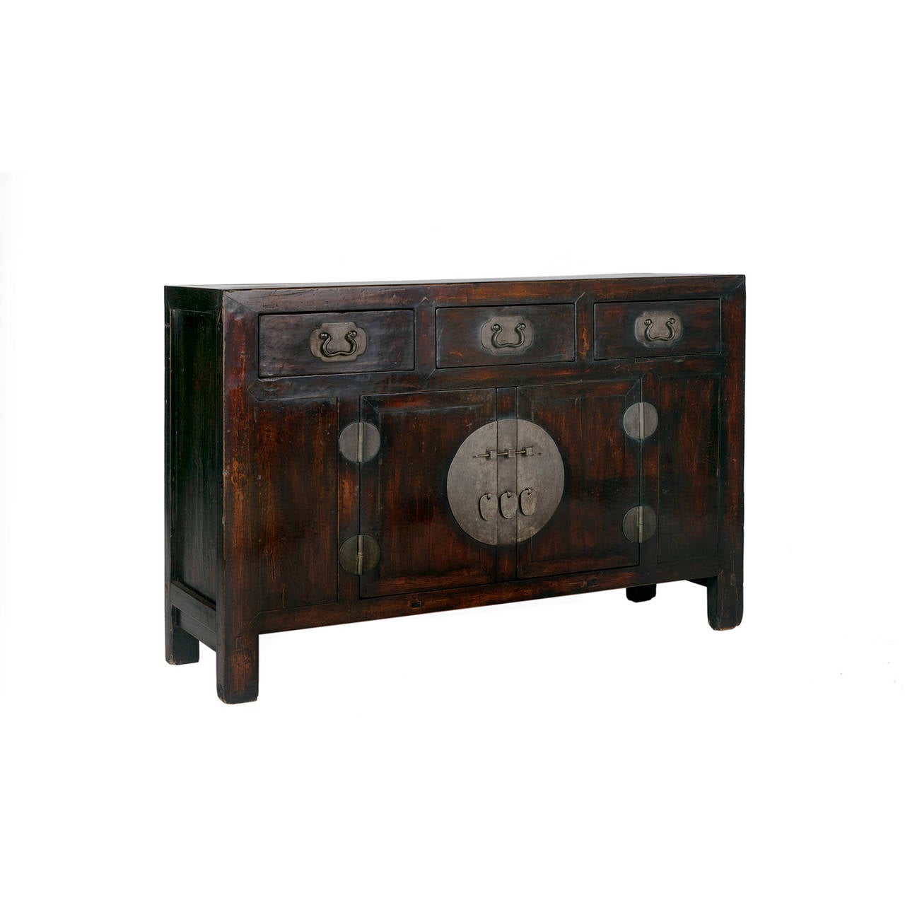 An elmwood coffer from Tianjin , China. This circa 1850 piece features three drawers and two folding doors, decorated with brass hardware.