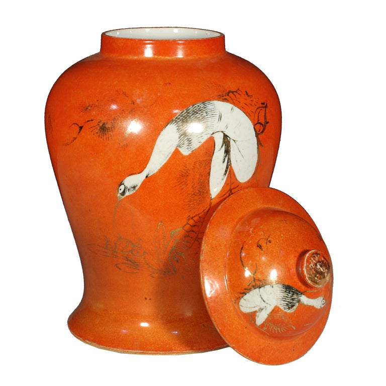 An early 20th century Chinese persimmon glazed porcelain ginger jar with gilt and painted crane and pine trees, a symbol of longevity.

Pagoda Red Collection #:  BJA091A


Keywords:  Jar, vase, vessel, urn, pot, garden, planter, patio, outdoor