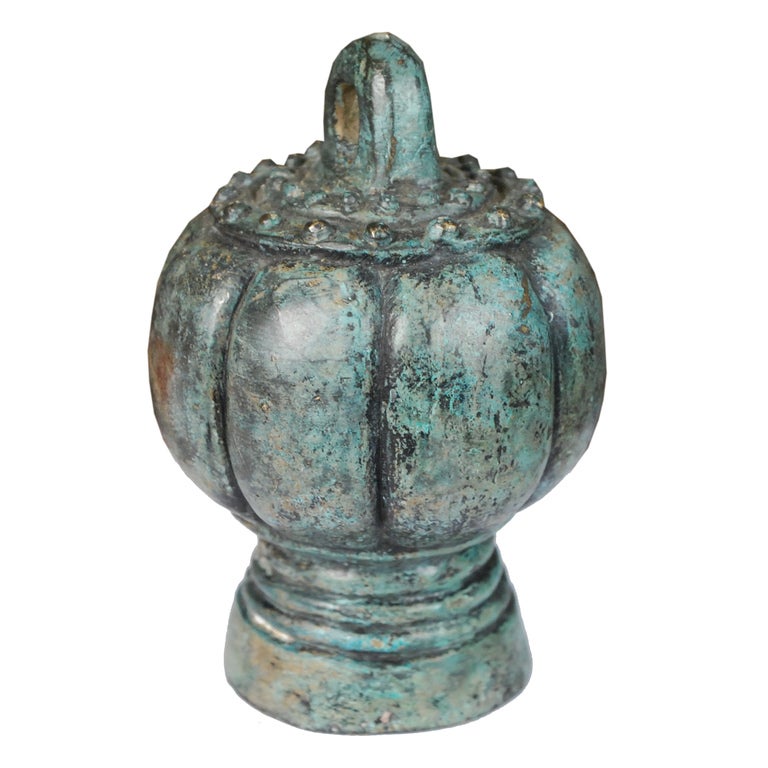 A bronze gourd shaped weight from Hebei Province, China. This weight features a lovely patina and inscribed mandarin text.

Pagoda Red Collection # BJAA117B