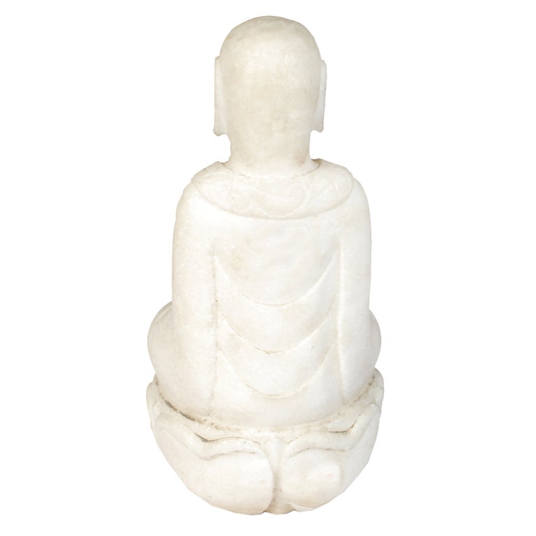 A 20th century Chinese carved white marble Buddha with medicine bowl in his hands, seated on a carved lotus base.

Pagoda Red Collection #:  BJAA035

Keywords:  Buddha, sculpture, statue, China, Chinese, Buddhist, Buddhism