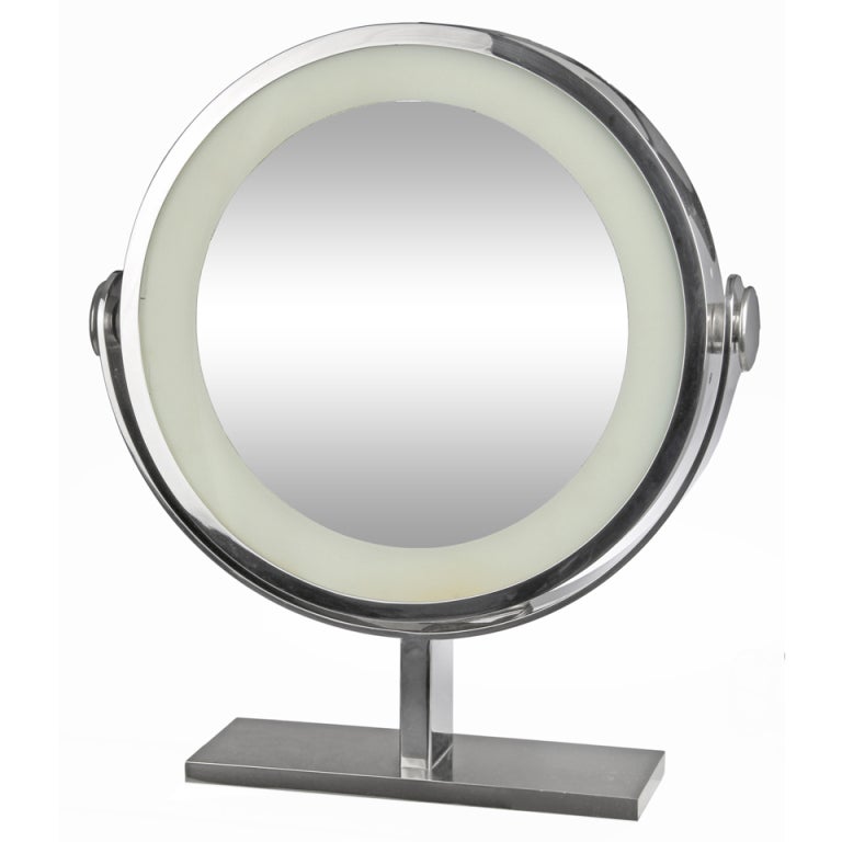 This is an outstanding and very large mirror that lights up and magnifies.  The back of the mirror is highly polished and can also be used as a mirror.
The quality of the  workmanship  is very good and it has an in line on/off switch. The mirror