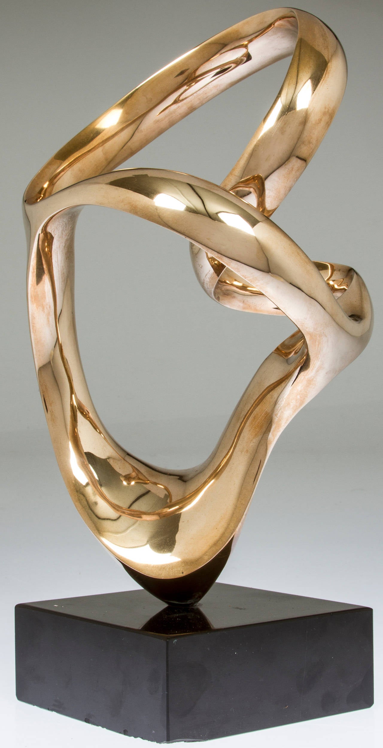 This is a wonderful polished bronze by Kieff. Nine out of an edition of nine, with a personal inscription by the artist.