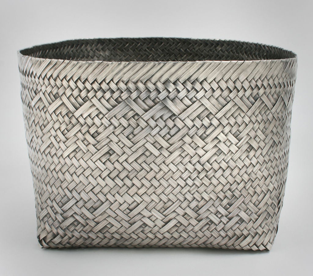 This is a wonderful woven sterling silver basket for Tiffany & Co. by Tane of Mexico.  It would look fabulous with an orchid plant.