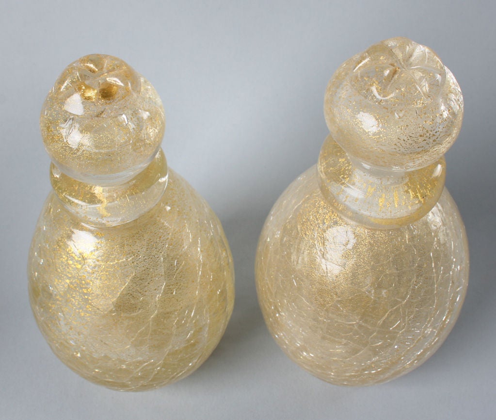 These are a lovely pair of gold Murano perfumes.
 