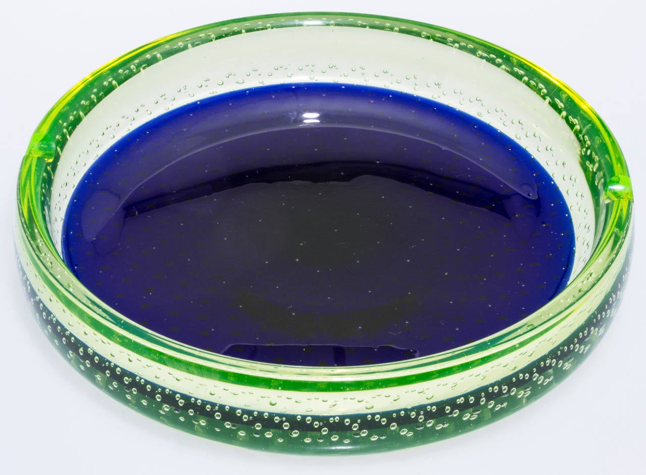 This is a gorgeous piece of glass.  The center is a cobalt blue that contrasts nicely with  the green yellow body.