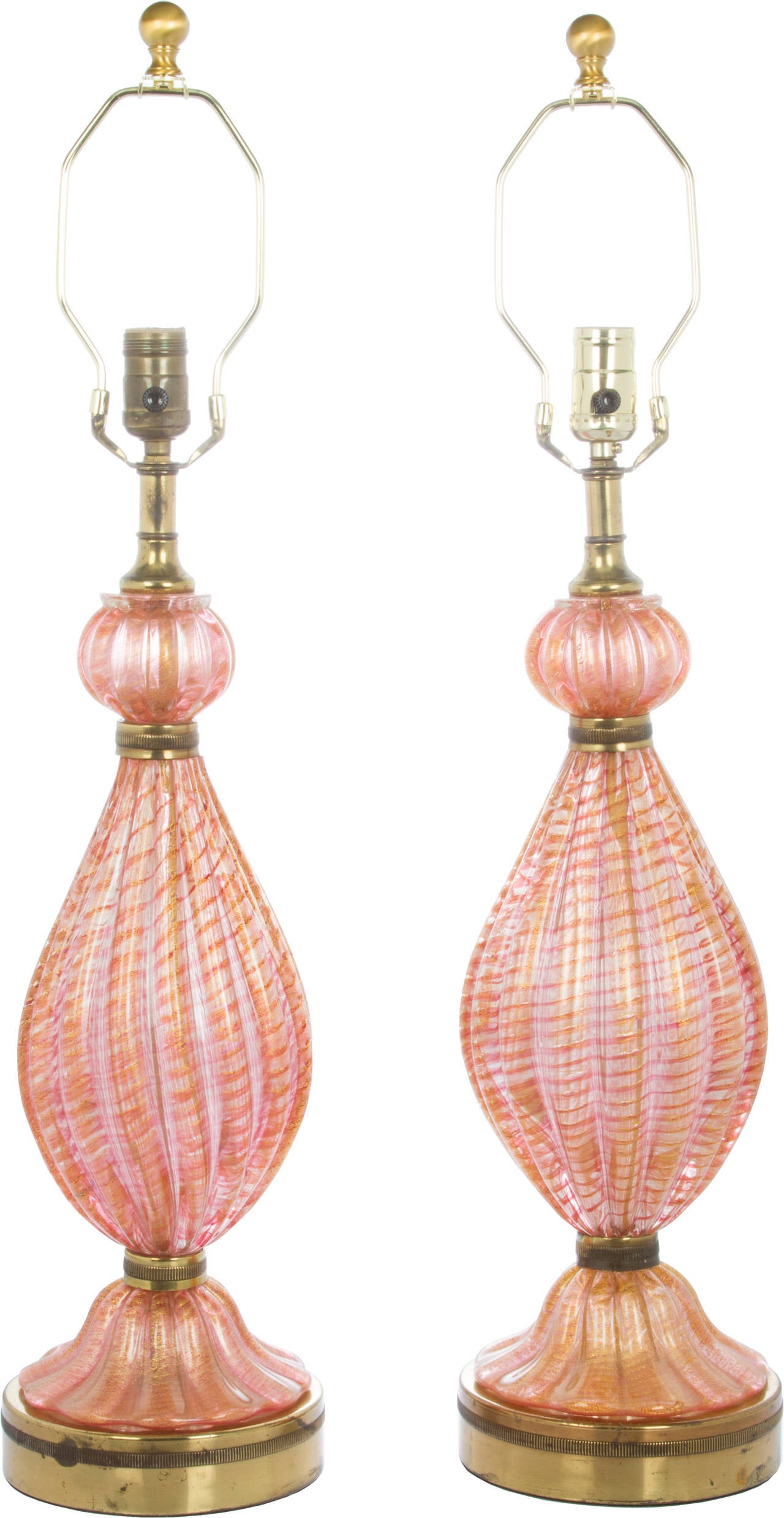 These are beautiful lamps in a coral rose color laced with gold.