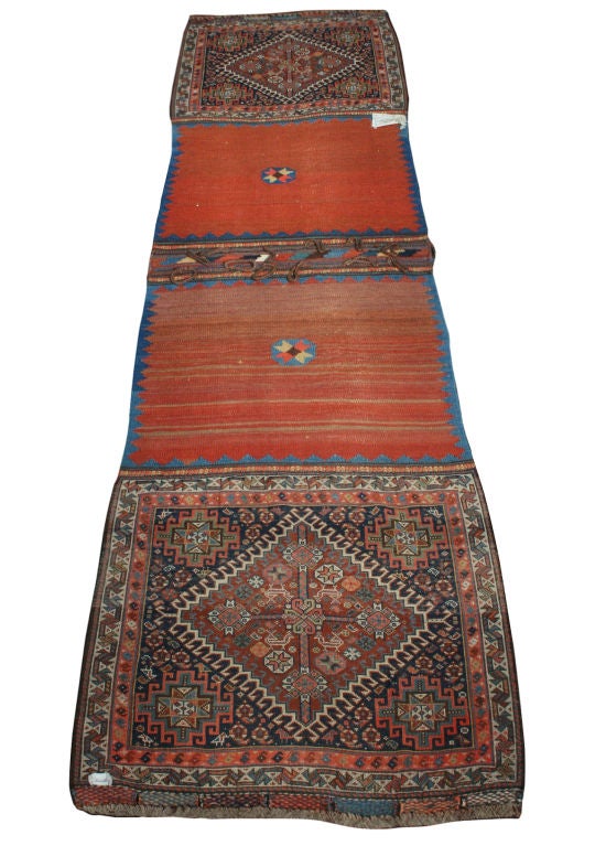 This is a rare and unusual example of Kashki saddlebags as this is a complete weaving of twin saddlebags that have not been seperated. Ideal as a wall hanging as it is visually interesting and has beautiful soft warm colors.