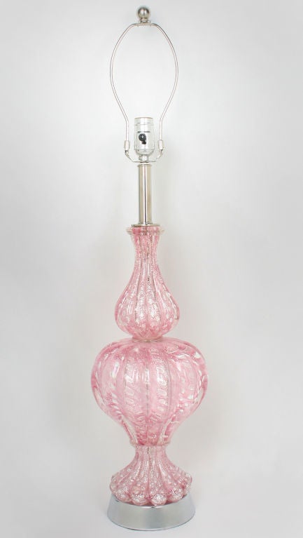 These are beautiful rose colored Italian glass lamps  highlighted with silver.