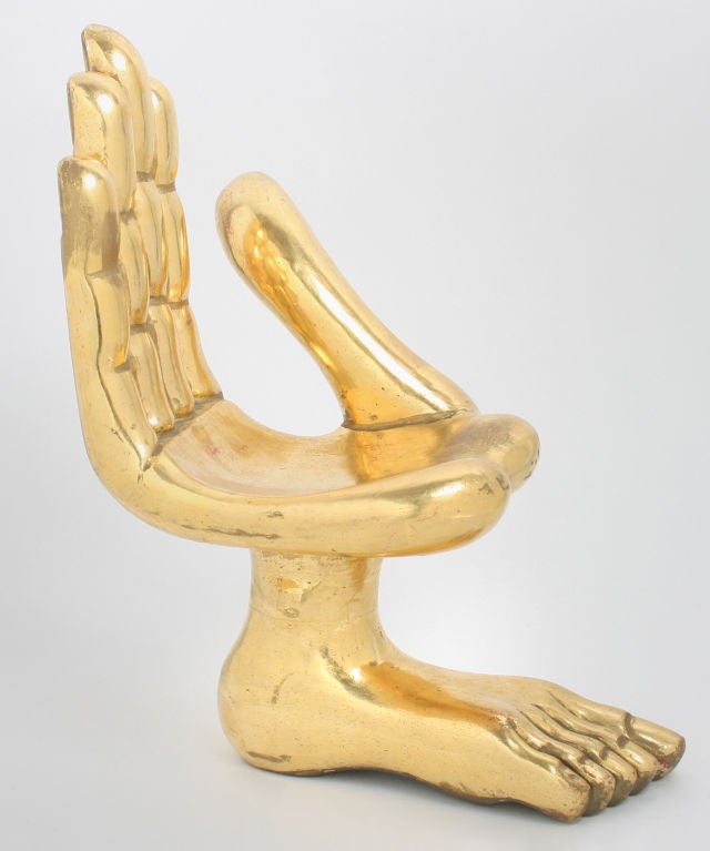 This is a great example of Friedeberg's hand foot chair. It is richly gilded.