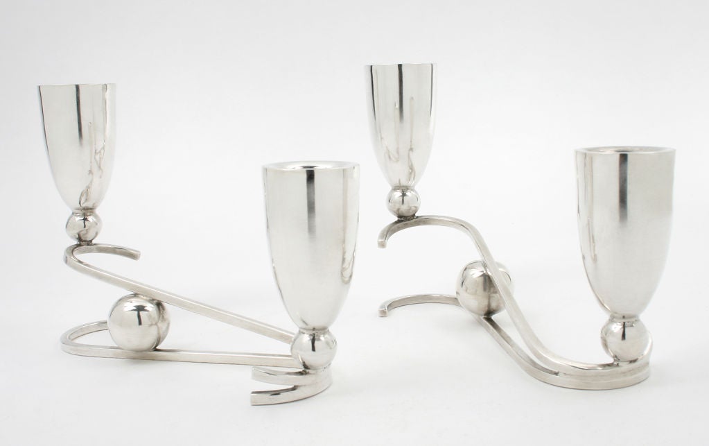 These are a nice pair of modernist 2 light candelabra.