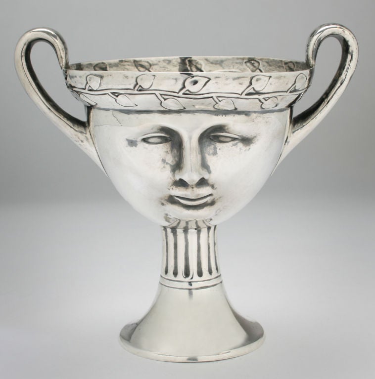 Modern for its time, this is a charming English loving cup that dates from 1907. It was given as a Christmas gift in 1925 and is a great object.  The loving cup is by George Nathan and Ridley Hayes also known as Nathan and Hayes