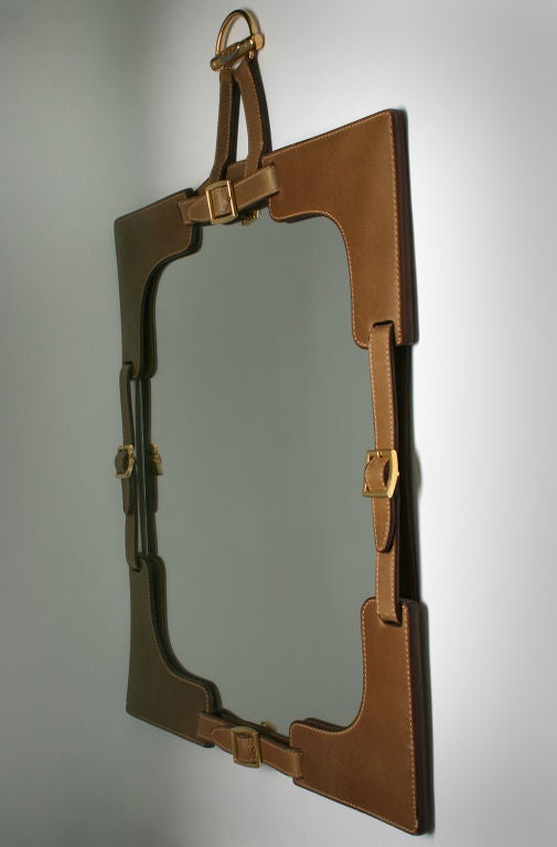 This is a wonderful leather mirror that epitomizes the Gucci look.