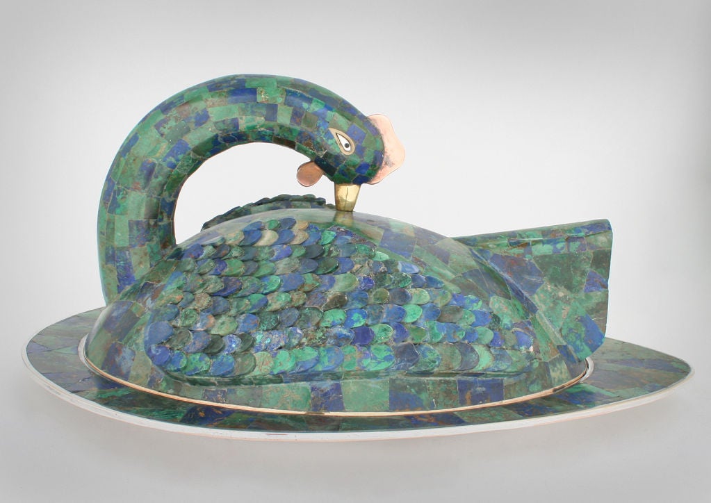This is a large and exceptional piece by Los Castillo. <br />
Castillo is noted for his use of stone and metal. The stylized bird has feathers of malachite and sodalite. This serving dish is so interesting it can double as a sculpture.