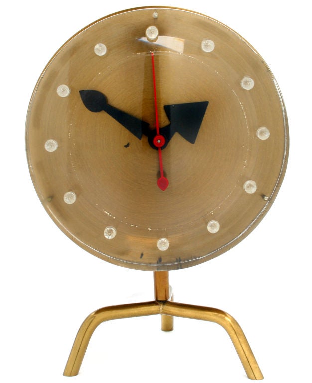 This is an original George Nelson Tripod Clock for Howard Miller.  This was Nelson's first desk clock and is signed 