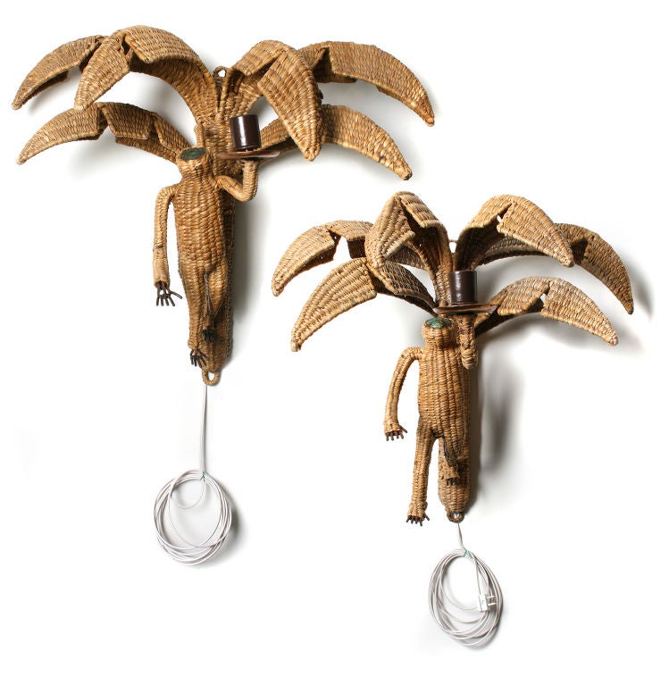 Hanging in palm trees, these monkeys are very whimsical. They have upward turned copper faces and copper hands and feet.  they are large enough to create a statement.<br />
*Measurements*<br />
These sconces vary slightly in size.<br />
23