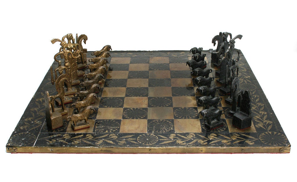 This is a very interesting and handsome chess set. The pieces are sculptural objects in themselves and are easy to handle. <br />
*Measurements*<br />
Chess board 23 3/4