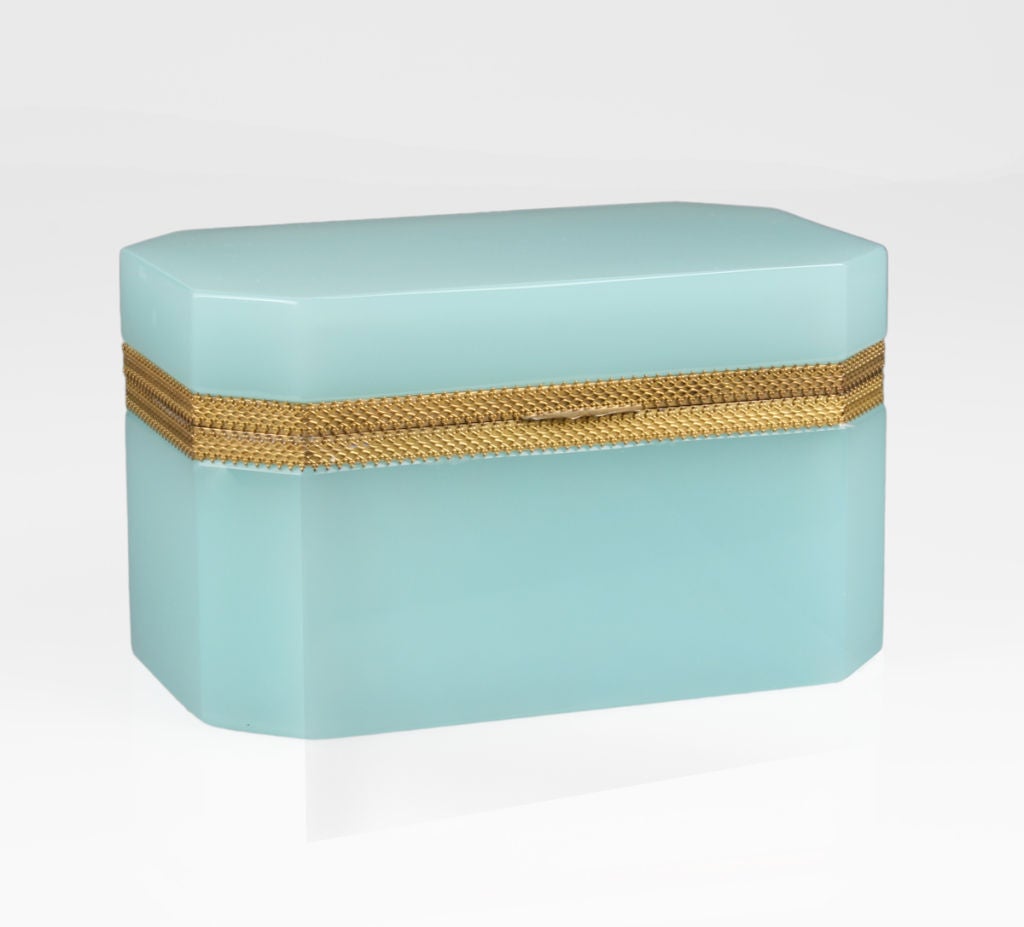 This is a beautiful large glass octagonal glass lidded box in a paler shade of Tiffany blue.