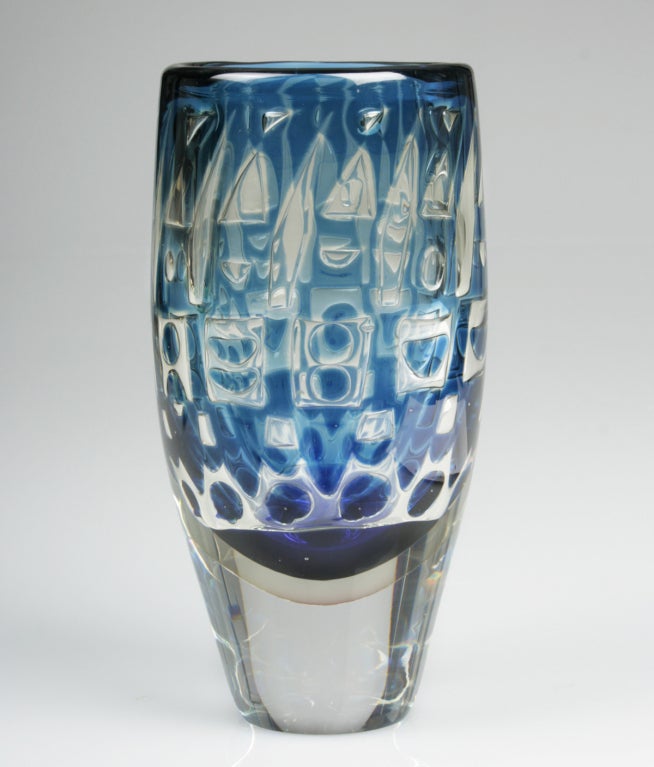 This is a  vibrant and optical Orrefors Glass Vase with geometric designs. Marked Ariel Na 405-E, Ingeborg Lundin. The pontil on this vase is masterfully polished.