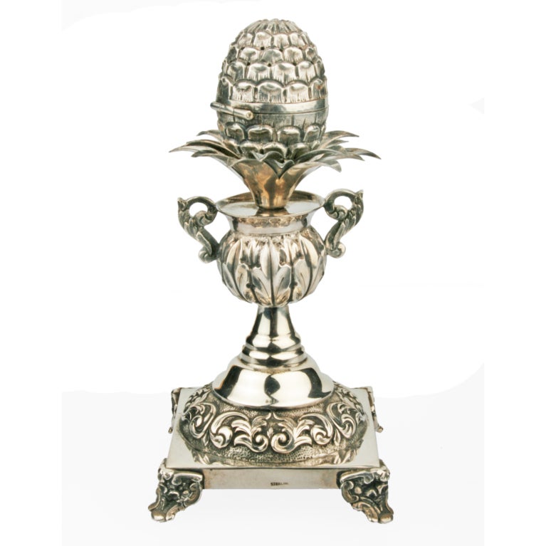 A highly elaborate sterling silver Besamin in urn form with a pineaple motif.