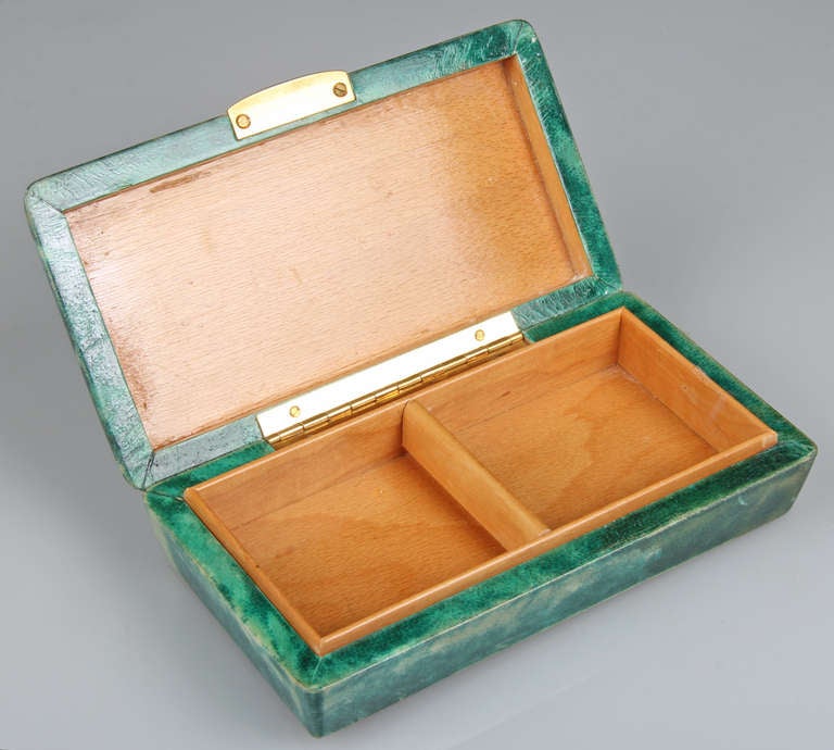 This hardwood box is covered in beautiful green parchment with a lacquer finish.