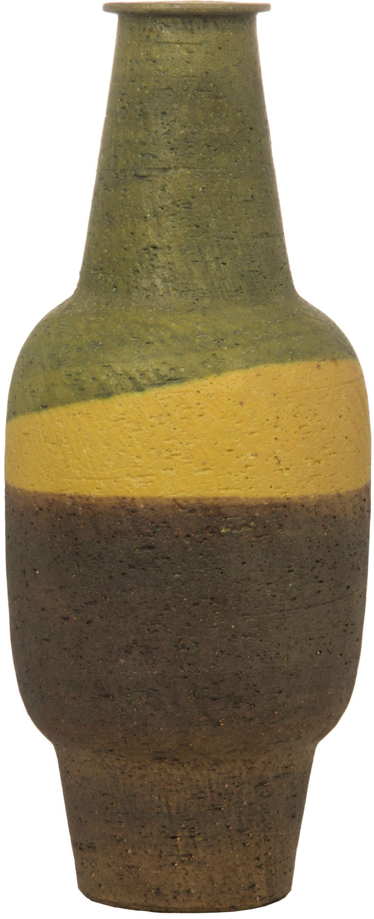 This is a very interesting vase, colors similar to those used by Sosstas.
It has a modern but earthy quality.