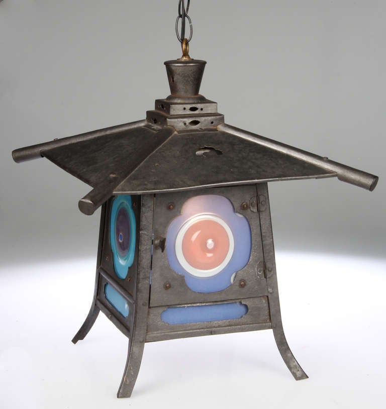 The combination of Higgins' glass (four panels and four inserts) perfectly compliment this traditional Japanese lantern form.
All original and vintage, the housing uses a standard bulb and the lamp has 44