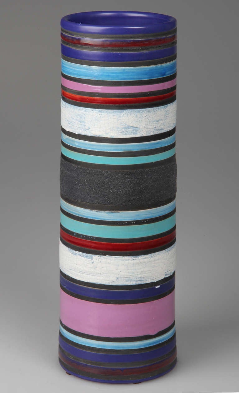 A tall Italian vase designed in the mid 1950's and striped with blue and red glazes.
Made by Bitossi and distributed by Raymor.
Marked 1393 A, Italy