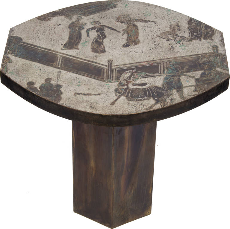 This rare format side table has a hexagonal base and a graceful  almost elliptical shaped top.