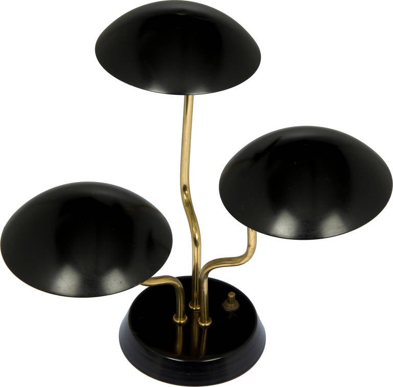 This is a wonderfully designed three-light table lamp by Gino Sarfatti.