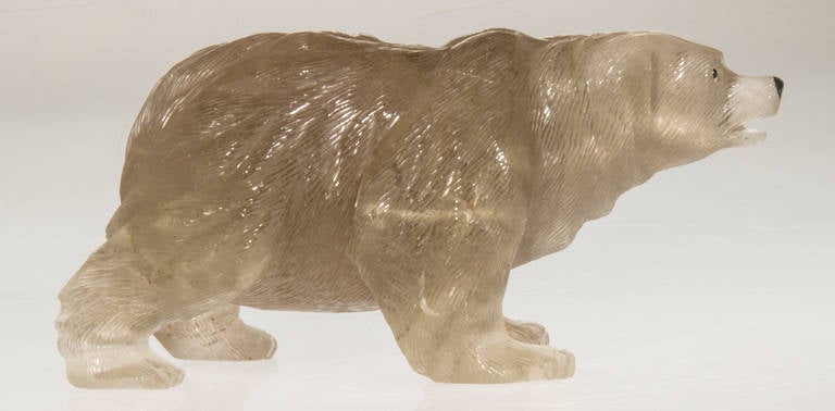 This is a very nicely carved quartz crystal bear sculpture.