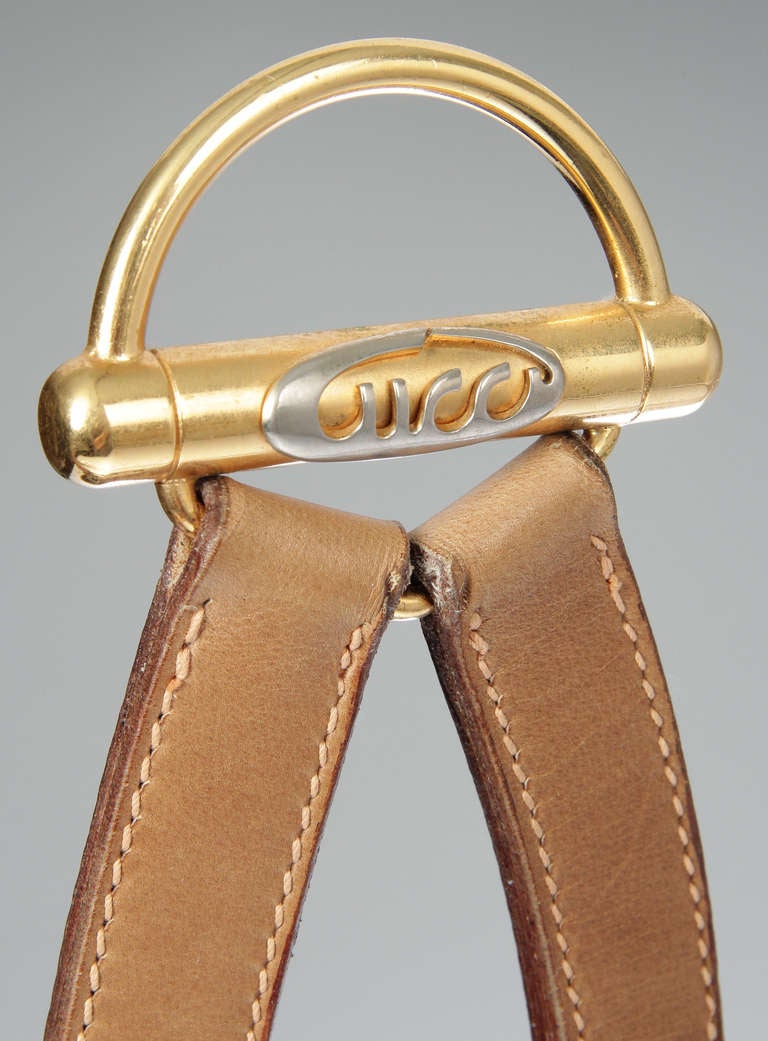 This is a great looking leather mirror by Gucci. 

Height including strap: 27 inches
Drop: 6 1/4 inches