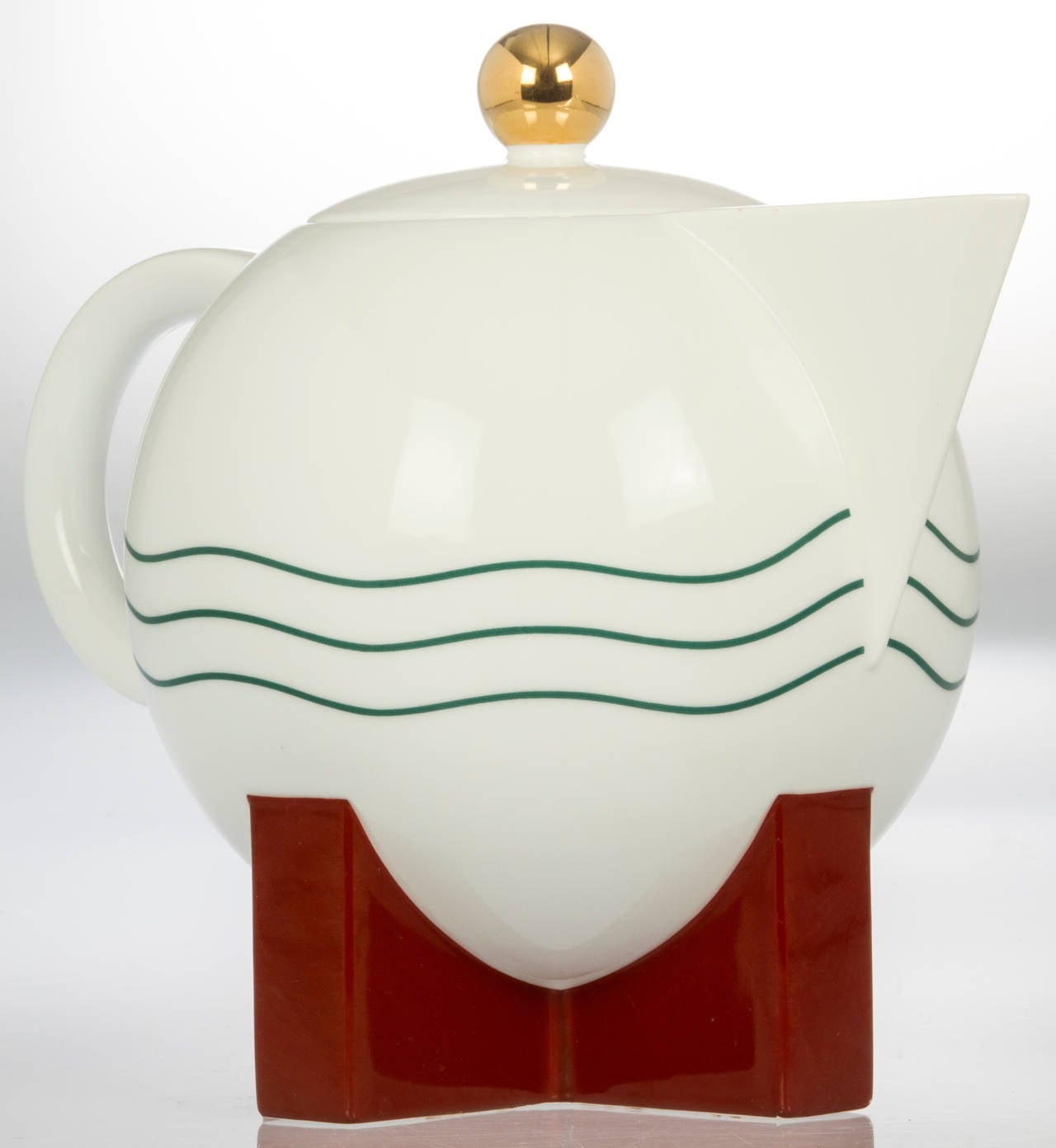 This Michael Graves designed set consists of the following: A coffee or teapot, a creamer, a lidded sugar bowl with the original spoon and coffee filter.