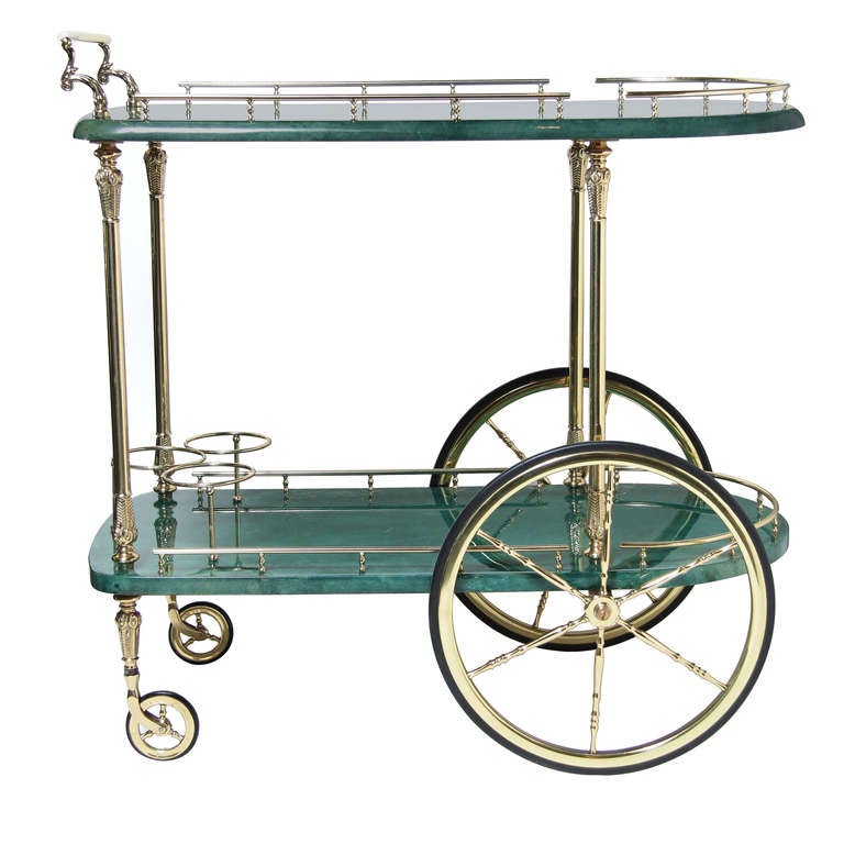 This is a beautiful and very usable bar cart, covered  in a wonderful green parchment.  Room for three bottles on the bottom.