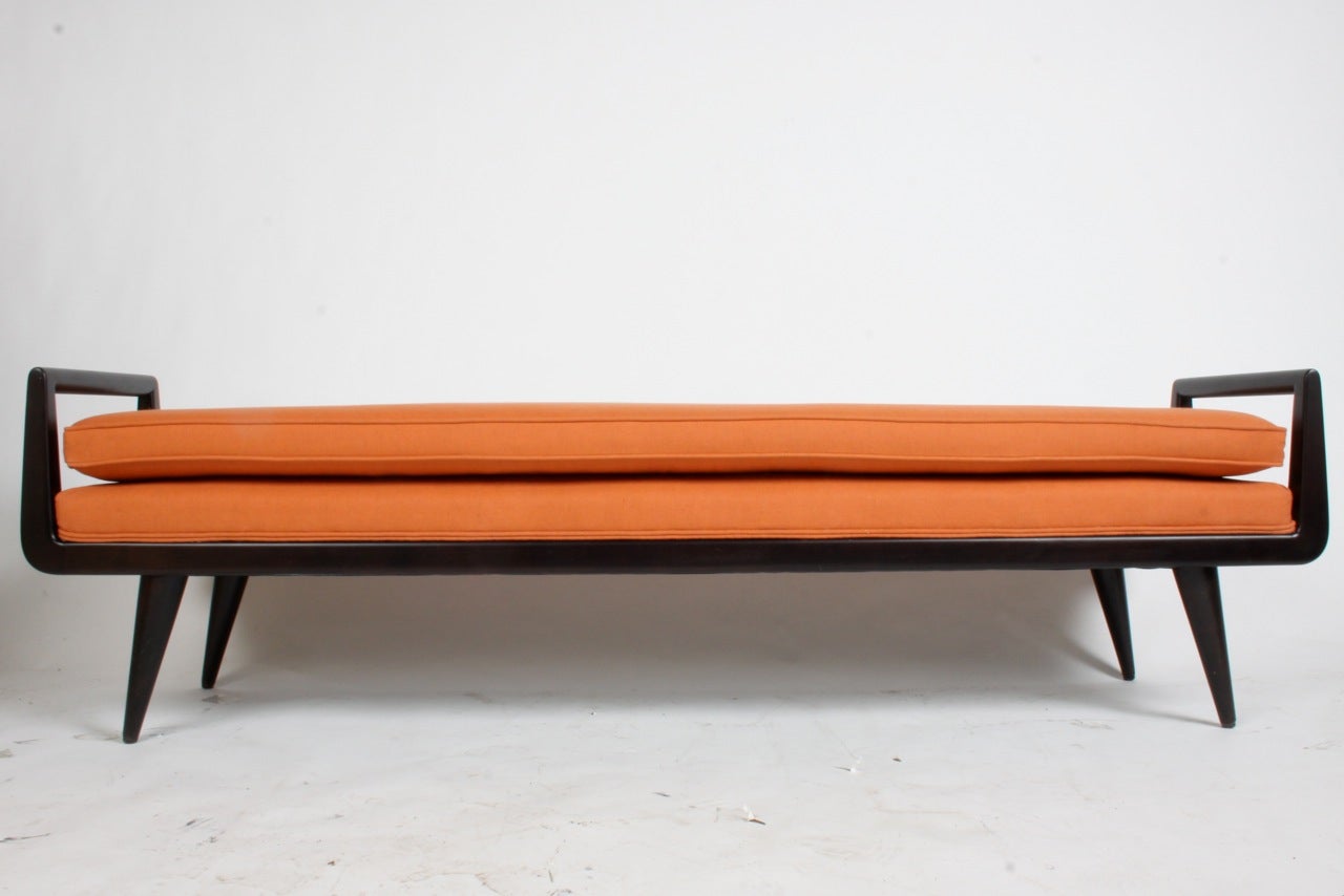 Mid-Century Modern mahogany bench with burnt orange upholstery 