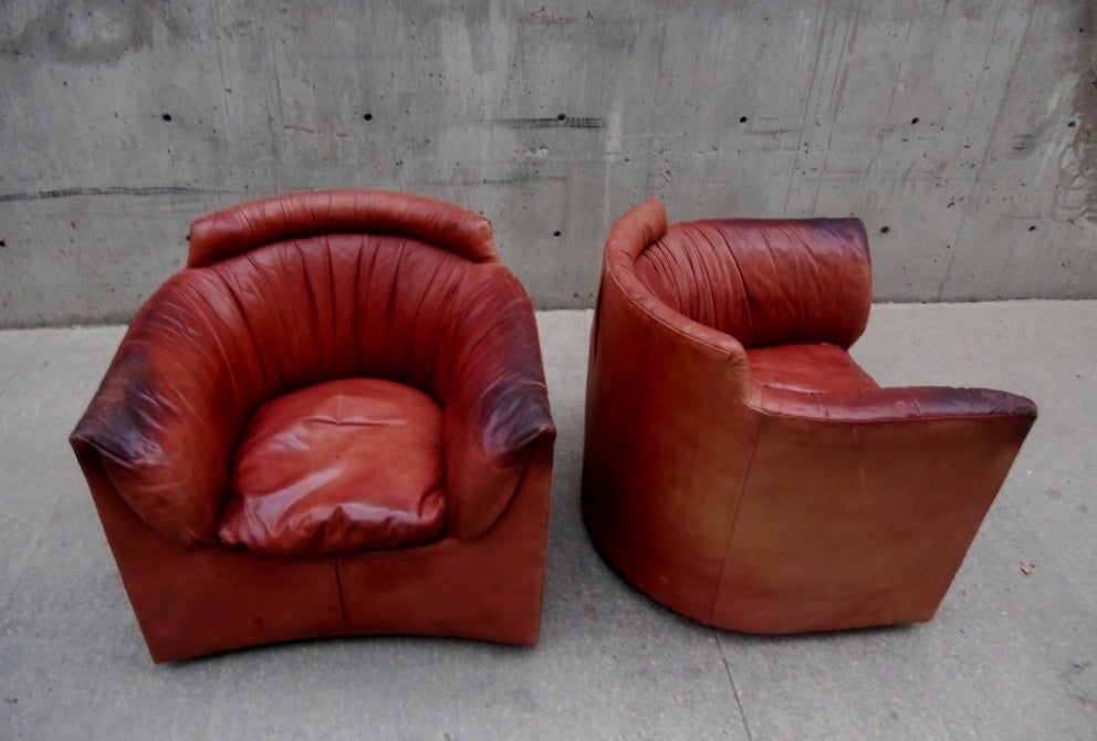 Designed for John Saladino's Facade collection for Baker, c.1985, pair of club chairs, labels, in original leather
