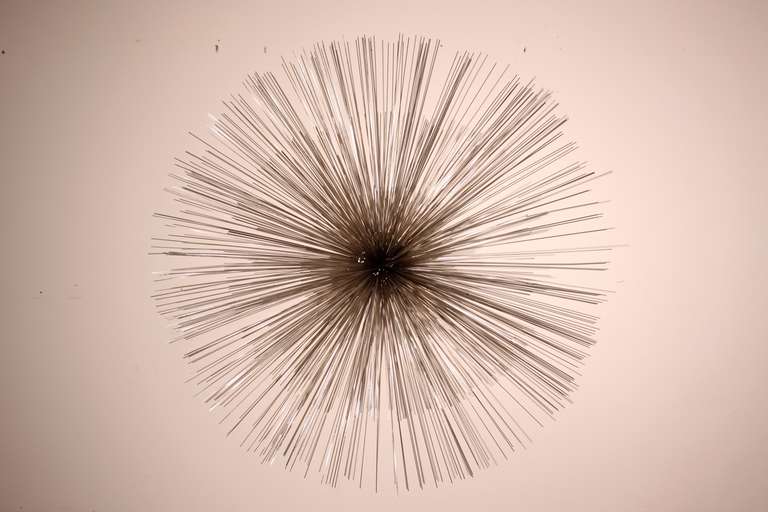 C. Jere Nickel  Tiered Sea Urchin wall sculpture with radiating rods evokes the style of Harry Bertoia