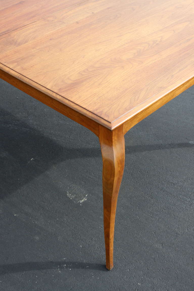 Walnut Custom Dining Table with Whiplash Legs and Four Extension Leaves