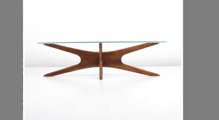 Sculptural wood base cocktail or coffee table by Adrian Pearsall for Craft Associates. Minor scratches to glass 

59.25 x 19.5 x15.3/4