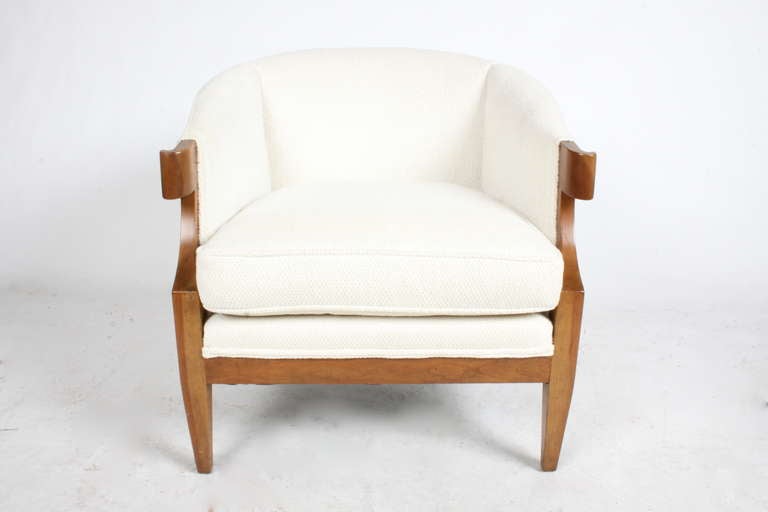 Pair of Baker curved arm occasional chairs from the 1940s to be refinished and reupholstered with COM. Measurements are 28w x 28h x 28.5 deep. 17.5 seat. Single chair available too. Photos of Chair redone dark is sold, shown for example in dark