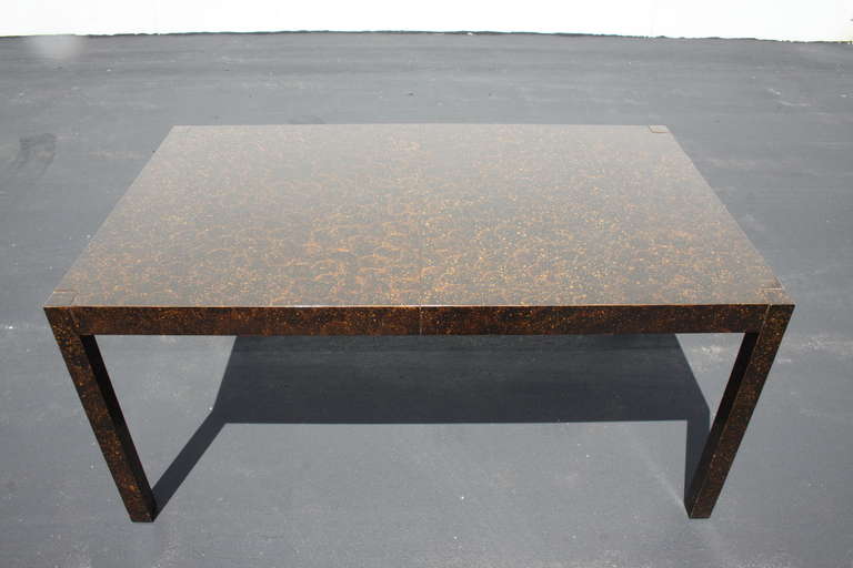 Late 60s dining table with oil spot finish in tortoise motif, from Drexel's Rapport line, two 19
