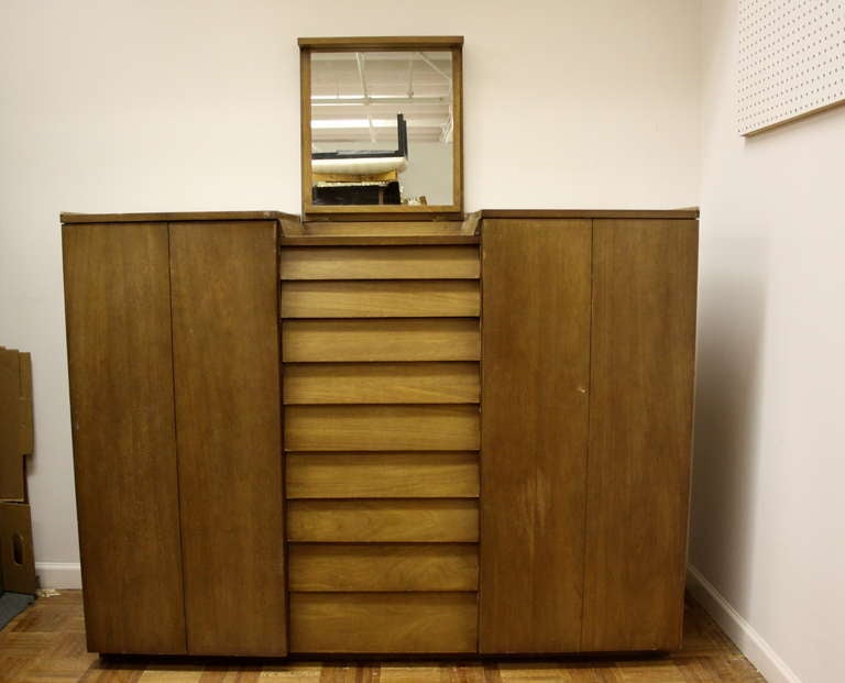 Mid-Century Modern Edward Wormley for Dunbar bachelors chest with flip-top mirror, drawers in center, flanked by two cabinet doors, in bleached mahogany, currently being refinished (can change finish color if desired).