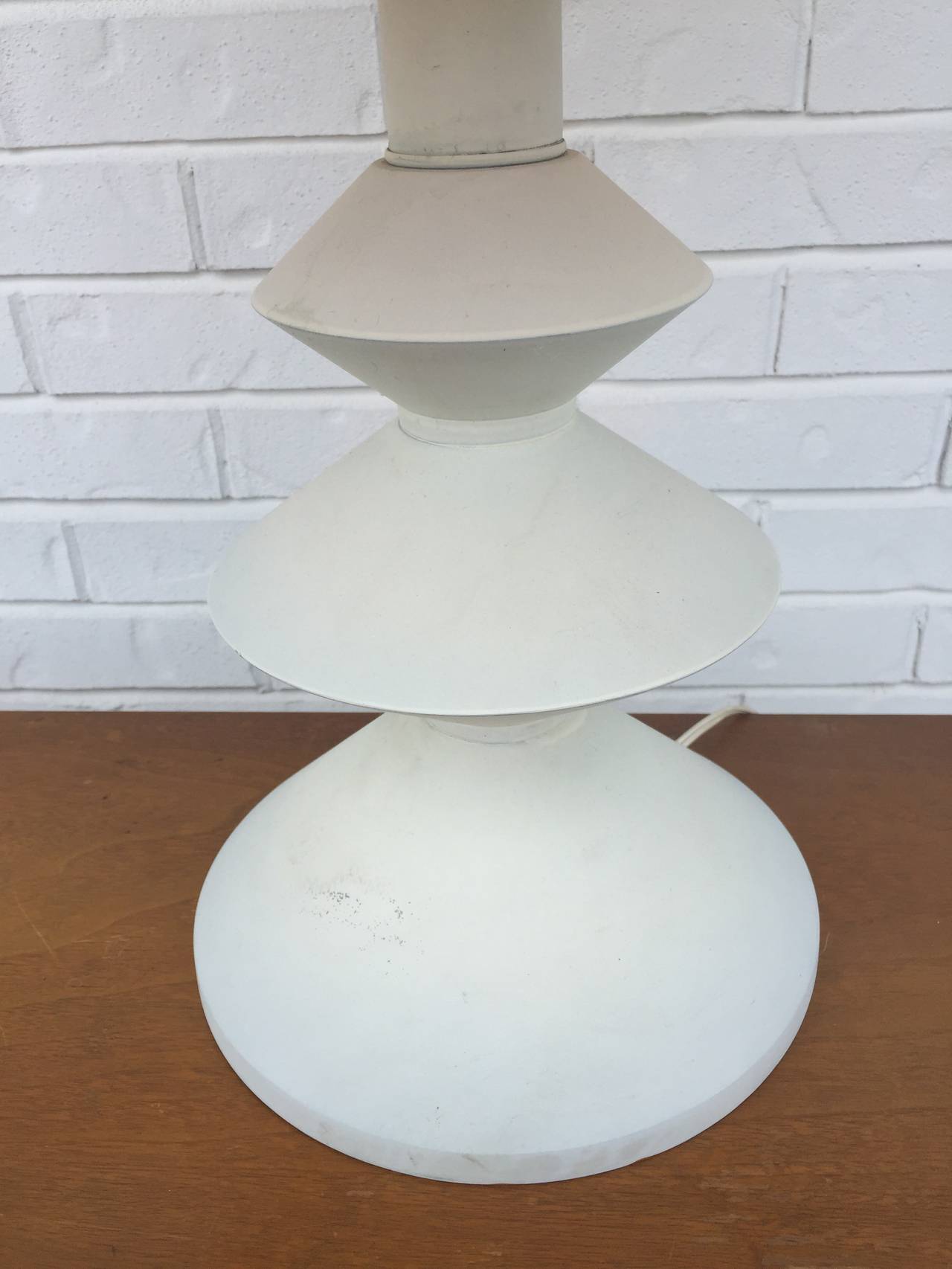 Midcentury as sculptural lamp after a design by Diego Giacometti. White textured painted metal lamp, shade shown for display only and not included.