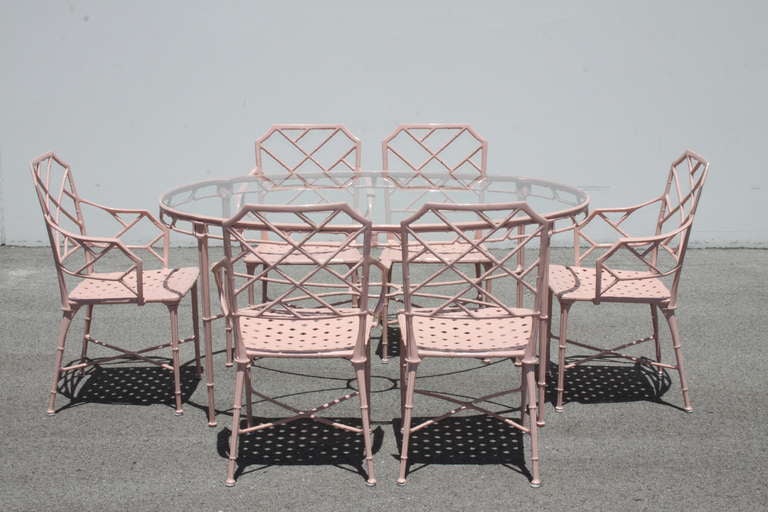 Chinese Chippendale faux bamboo Patio set, Oval table with glass top, 4 arm chairs and 2 side chairs, original pink enameled metal, never used outside, in very good condition, arm chairs are 35
