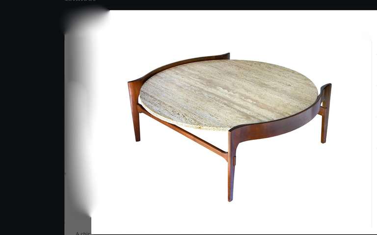 Coffee table, designed in the 1950s by Gio Ponti associate Bertha Schaefer. Made in Italy for Singer and Sons of Italian walnut and travertine. 
The underside of the travertine top is marked with a label that reads 