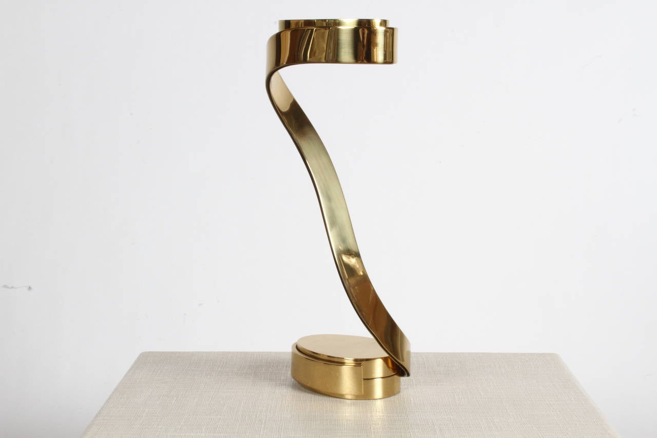 Sculptural brass table lamp, model number, circa 1899 limited edition signed and numbered, designed by Georgina Aasen for Casella Lighting. Priced for each lamp, inline dimmer switch and quarts light.
Pair available.
One is 17.75