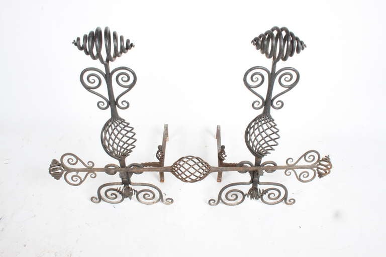 Pair of hand-wrought andirons by Architectural firm of Maritz and Young, firm that designed many of the most prominent homes in the early 20th century in St. Louis. These are from architect W. Ridgely Young's personal residence, circa 1920s and