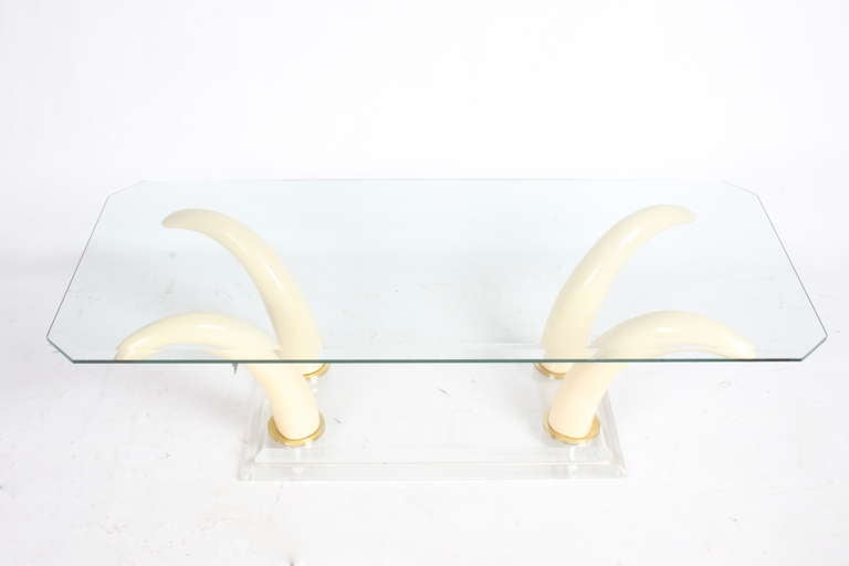 American Faux Tusk Cocktail Table with Lucite Base and Glass Top