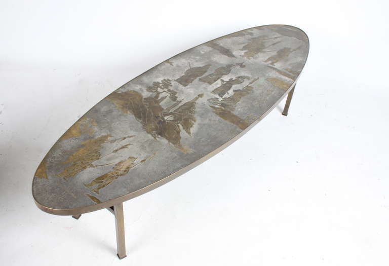 Surfboard shaped top bronze table by Philip & Kelvin Laverne.  Acid etched and patinated brass over pewter & wood, etched signature to the top c. 1965