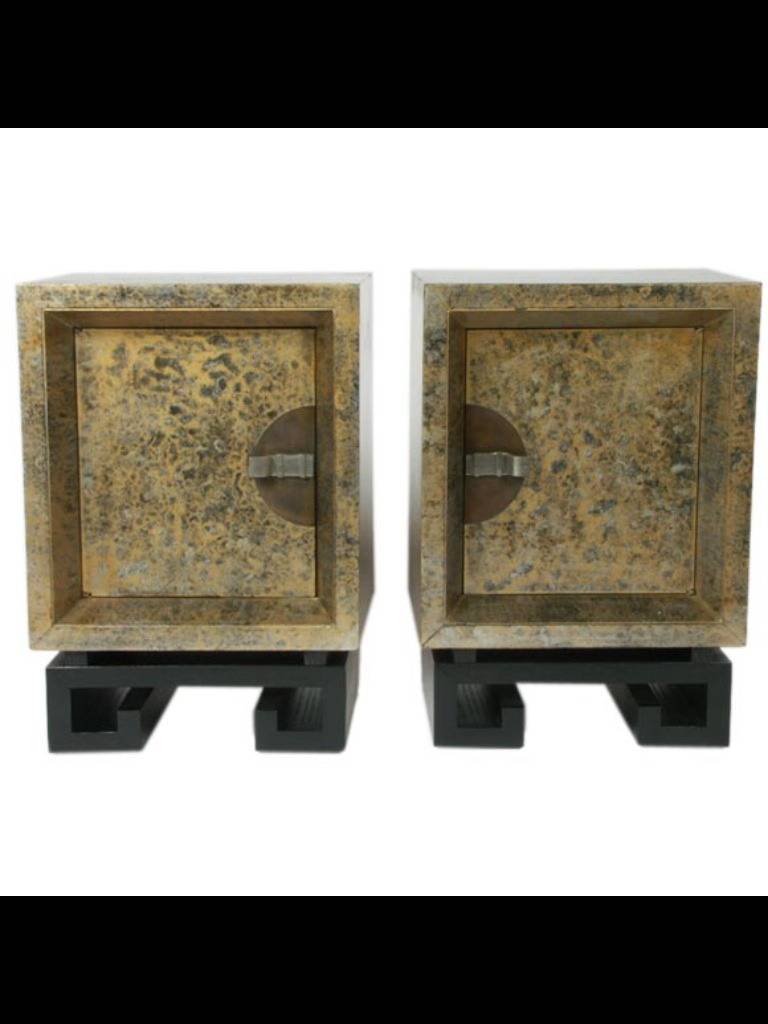 Stunning and unusual, silver and gilt lacquer nightstands with ebonized oak Greek Key bases. Each with a single interior shelf. 
Measures: Height: 26.5 in. (67 cm)
Width: 18 in. (46 cm)
Depth: 14 in. (36 cm).