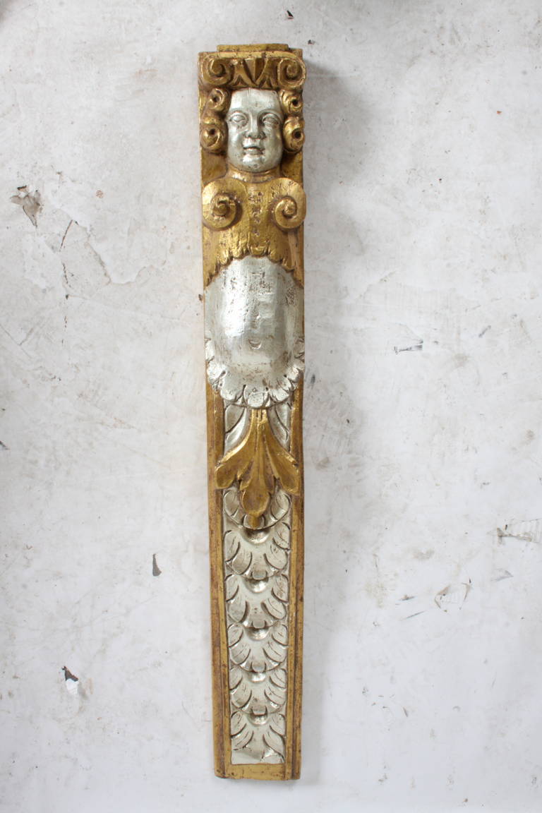 Plaster figural plaques from the 1940s, gilt and silver finish on plaster.